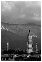 San Ta Si (Three pagodas) at sunrise with Cang Shan mountains in the background. Dali, Yunnan, China ( black and white)
