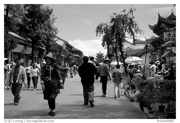On one of the recently enlarged pedestrian streets. Dali, Yunnan, China (black and white)