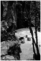 Quiet courtyard between limestone pillars. Shilin, Yunnan, China ( black and white)