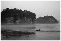 Cliffs of Lingyun Hill and Wuyou Hill at dusk, whose shape evokes a lying buddha. Leshan, Sichuan, China ( black and white)
