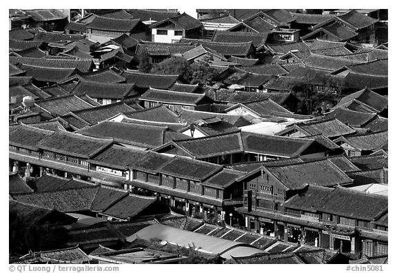 Rooftops of the old town seen from Wangu tower. Lijiang, Yunnan, China (black and white)