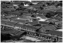 Rooftops of the old town seen from Wangu tower. Lijiang, Yunnan, China ( black and white)