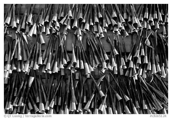 Tobacco pipes. Lijiang, Yunnan, China (black and white)