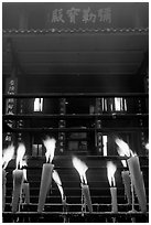 Candles burning in front of Wannian Si temple. Emei Shan, Sichuan, China ( black and white)