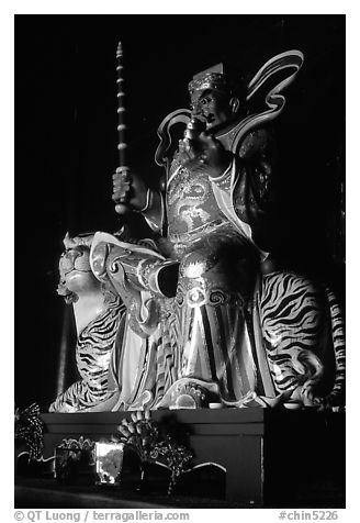Sculpture inside Xiangfeng temple. Emei Shan, Sichuan, China (black and white)