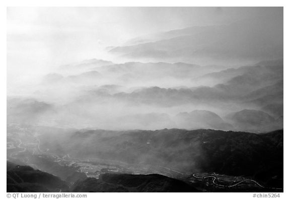 Receding ridges in fog, seen from Jinding Si, morning. Emei Shan, Sichuan, China