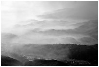 Receding ridges in fog, seen from Jinding Si, morning. Emei Shan, Sichuan, China ( black and white)