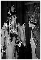 Two characters of Sichua opera on stage. Chengdu, Sichuan, China (black and white)