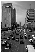 Car traffic on a major avenue. Chengdu, Sichuan, China (black and white)