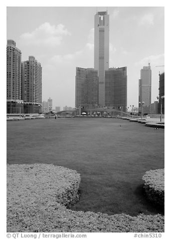 Landscaped plaza and highrises near the East train station. Guangzhou, Guangdong, China (black and white)