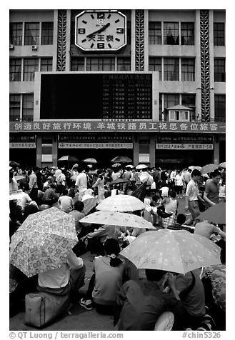 Crowds waiting outside the main train station. Guangzhou, Guangdong, China (black and white)