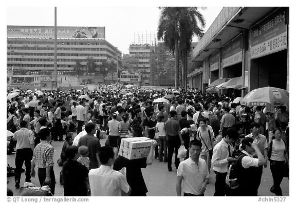 Crowds waiting outside the main train station. Guangzhou, Guangdong, China (black and white)