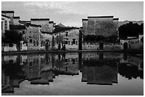Houses reflected in Moon Pond. Hongcun Village, Anhui, China ( black and white)