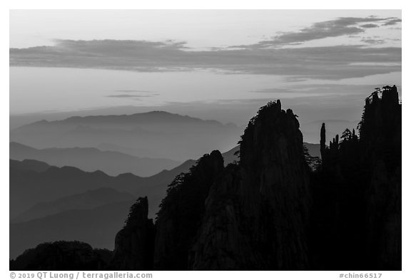 Spires and ridges at sunrise. Huangshan Mountain, China (black and white)