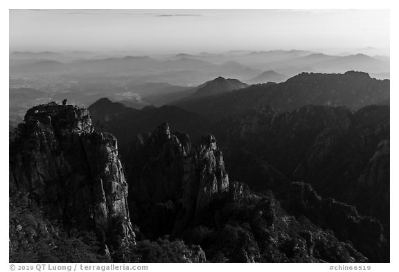 Stone Monkey Watching the Sea view at sunrise. Huangshan Mountain, China (black and white)