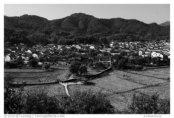Fields and village. Xidi Village, Anhui, China (black and white)