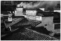 Rooftops and smoke. Xidi Village, Anhui, China ( black and white)