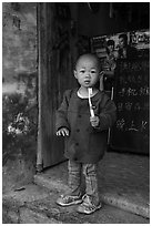 Boy with toothbrush. Xidi Village, Anhui, China ( black and white)