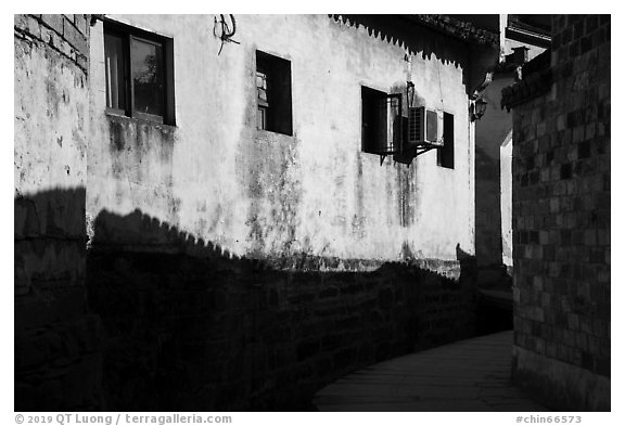 Roof shadows and wall. Xidi Village, Anhui, China (black and white)