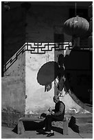 Elderly woman eating. Xidi Village, Anhui, China ( black and white)