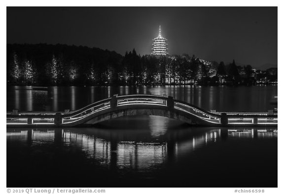 Long Bridge and Leifeng Pagoda at night, West Lake. Hangzhou, China (black and white)