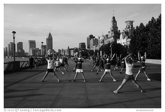 Morning group exercise on the Bund. Shanghai, China (black and white)