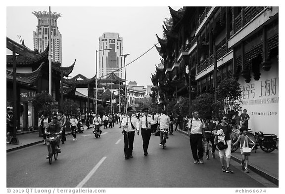Fangbang Middle Road touristified old streets and modern towers. Shanghai, China (black and white)