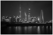 Peoples Memorial and city skyline at night. Shanghai, China ( black and white)