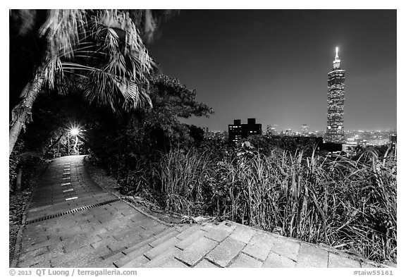 Path on Elephant Mountain with Taipei 101 in the distance at night. Taipei, Taiwan