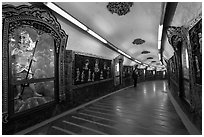 100 meter tunnel lined with brightly painted deities, Guandu Temple. Taipei, Taiwan ( black and white)