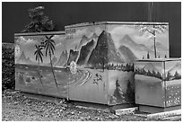 Decorated electric utilities boxes and wall. Taipei, Taiwan (black and white)