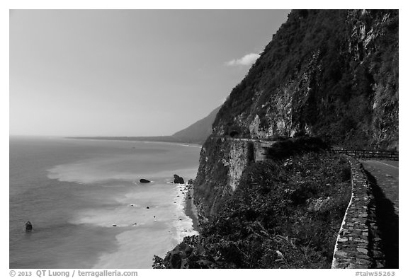 Road atop steep see cliffs overlooking ocean. Taroko National Park, Taiwan