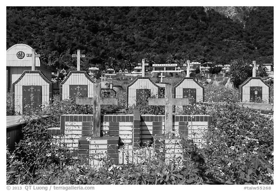 Tombs below lush cliff, Chongde. Taiwan (black and white)