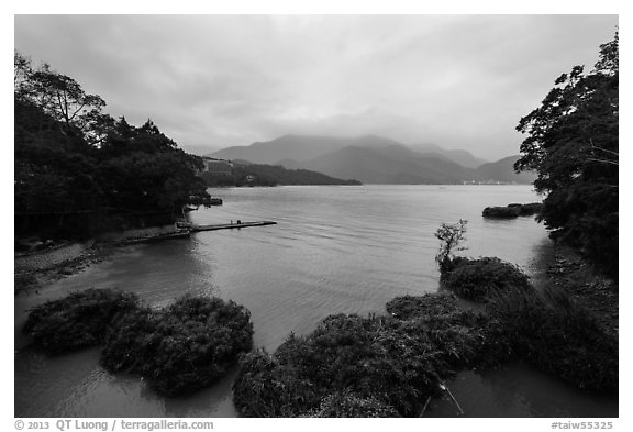 Cove with floating rafts on which plants are being grown. Sun Moon Lake, Taiwan