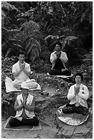 Members of religious sect in meditation. Sun Moon Lake, Taiwan (black and white)
