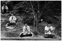 Group meditating in forest. Sun Moon Lake, Taiwan ( black and white)
