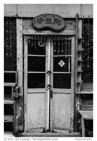 Old door with paddlock. Lukang, Taiwan (black and white)