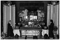 Main hall altar during buddhist service, Longshan Temple. Lukang, Taiwan (black and white)