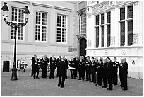 Choir singing on the Burg. Bruges, Belgium ( black and white)