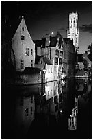 Old houses and belfry, Rozenhoedkaai, night. Bruges, Belgium (black and white)