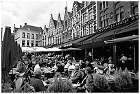 People in restaurants on the Markt. Bruges, Belgium ( black and white)