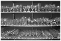 Large variety of glasses used to drink specific beers. Bruges, Belgium ( black and white)