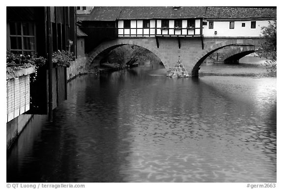 Timbered houses built accross the river. Nurnberg, Bavaria, Germany (black and white)