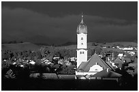 Nesselwang and St Andreas church, storm light. Bavaria, Germany ( black and white)