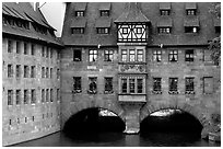 House built accross the river. Nurnberg, Bavaria, Germany (black and white)