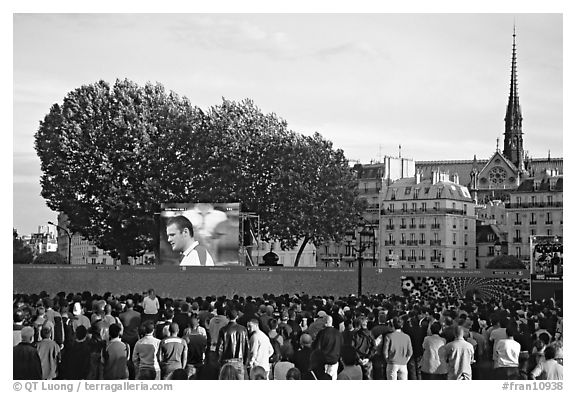 Crowds watch a broadcast of a soccer match near Hotel de Ville. Paris, France