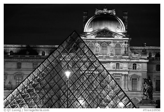 Pyramid and Louvre at night. Paris, France