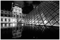 Louvre, Pei Pyramid and basin  at night. Paris, France (black and white)