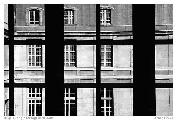 Versailles Palace walls seen from a window. France (black and white)