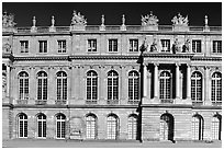 Frontal view of the Palais de Versailles, late afternoon. France ( black and white)